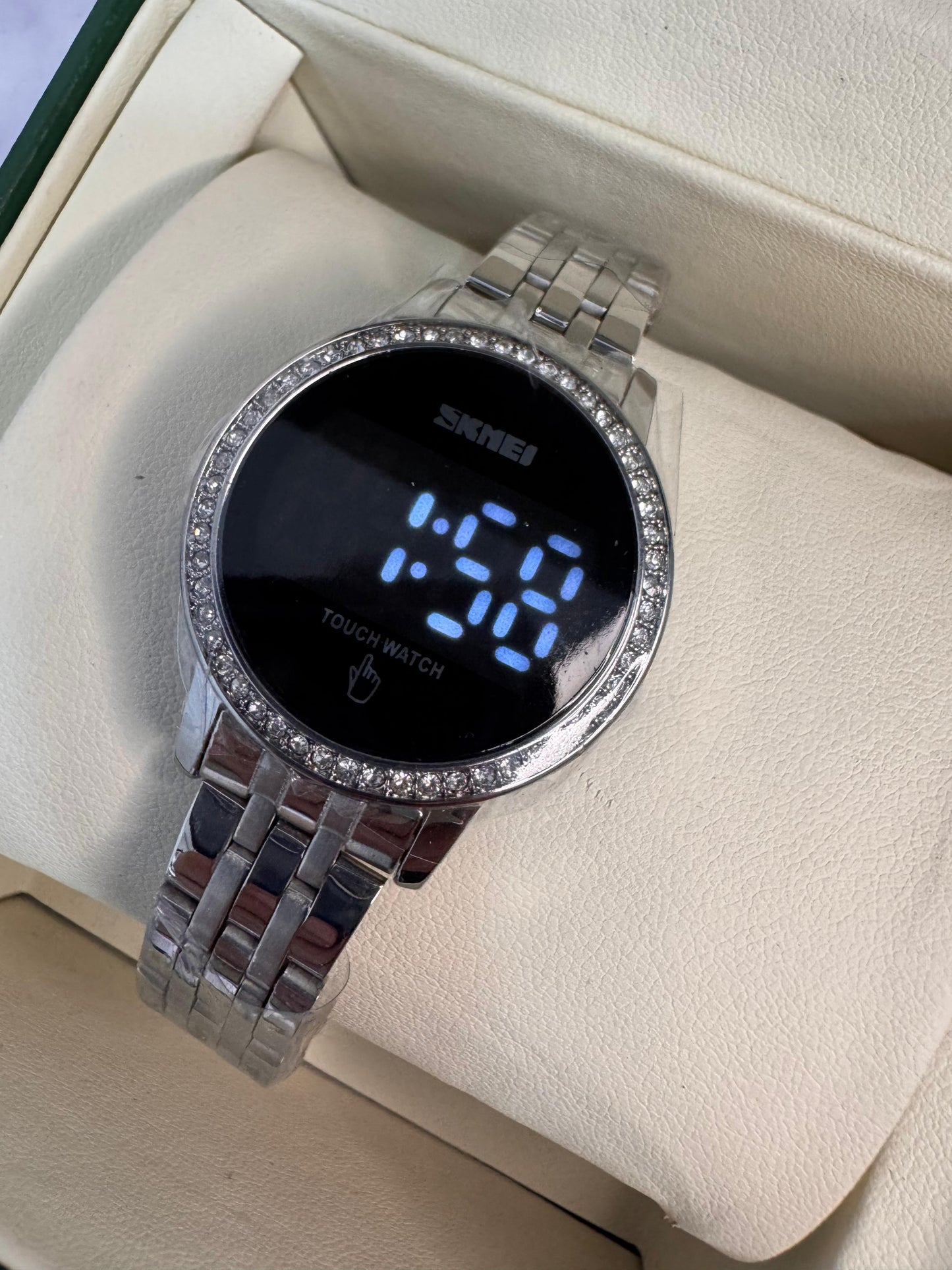 Reloj one touch
